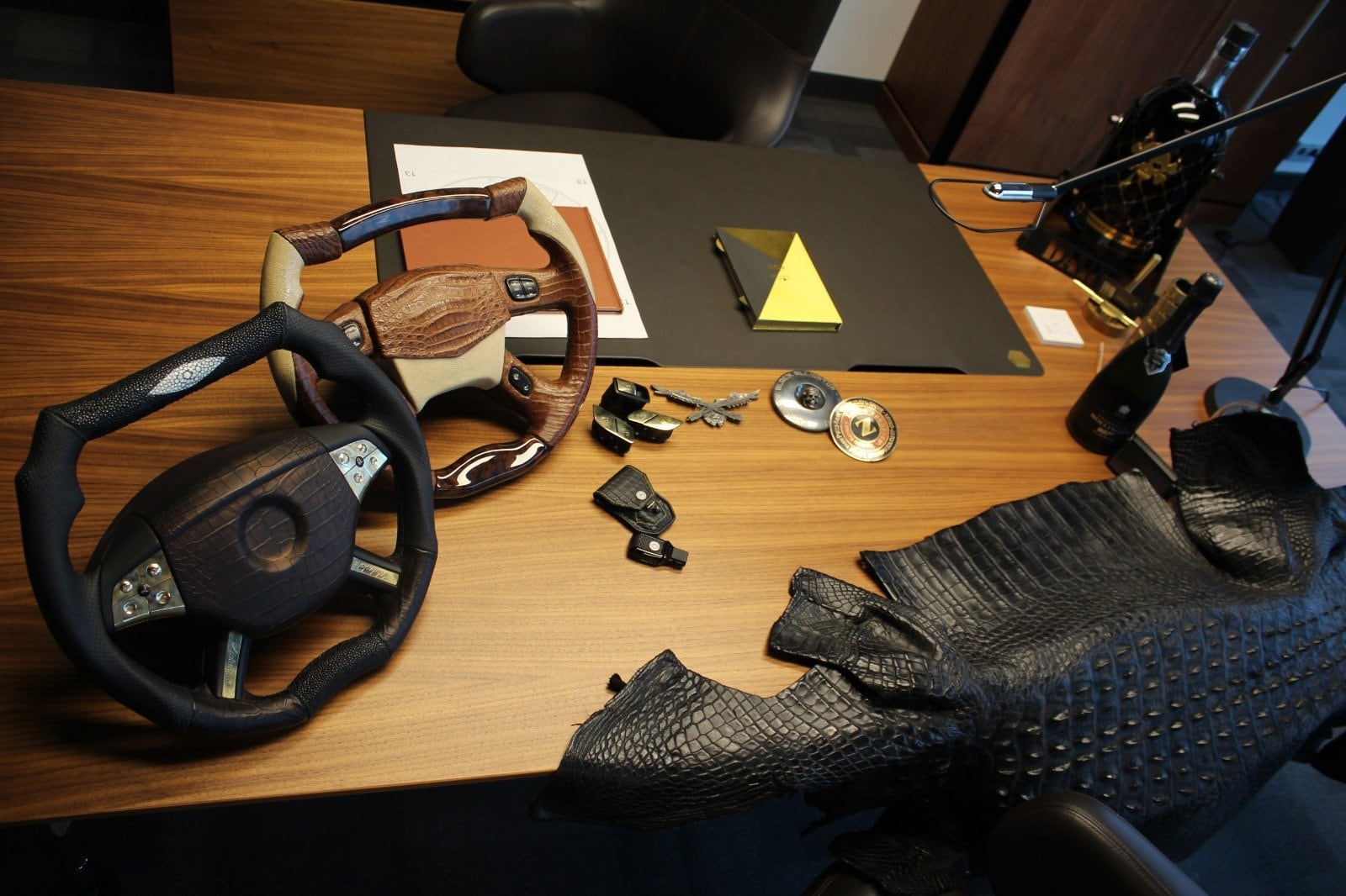 Steering wheels and crocodile hides on the DARTZ design desk